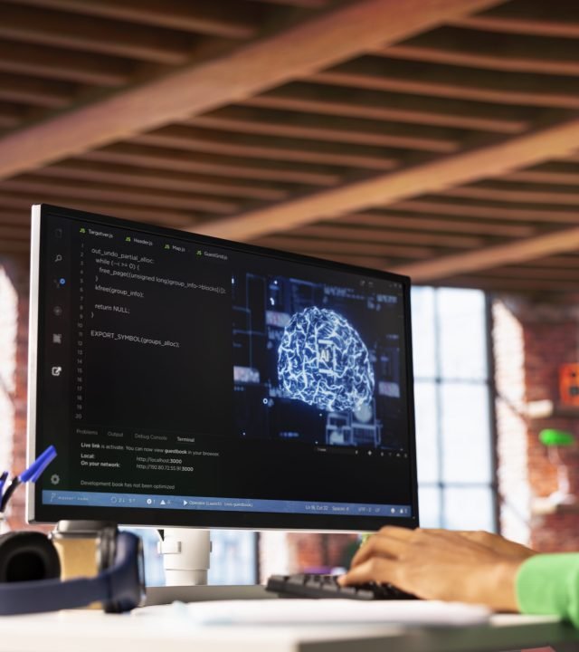 close up of man working in tech support doing checkup on ai systems